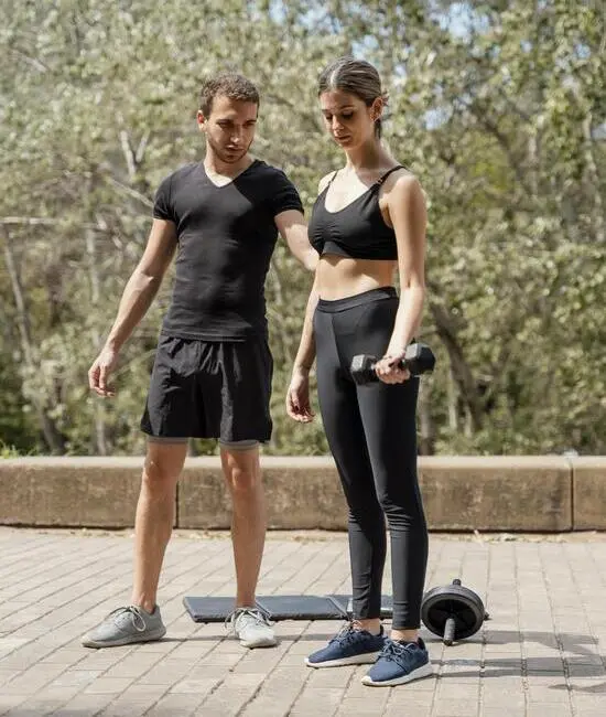 Men and women wearing black custom made gym wear