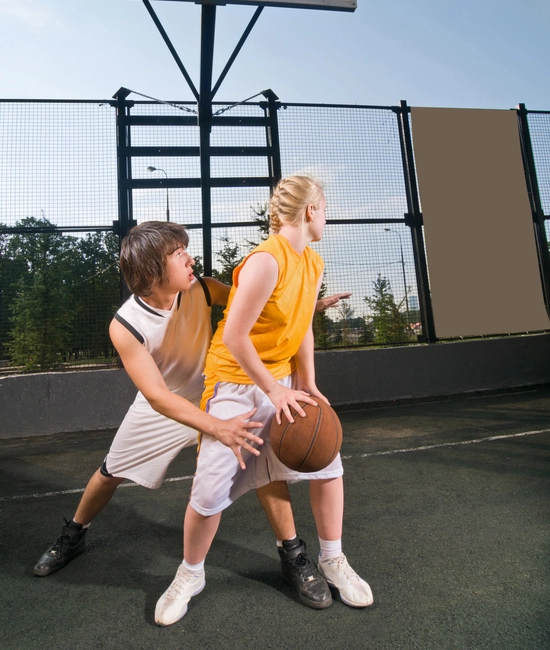 Players wearing custom-made basketball uniforms