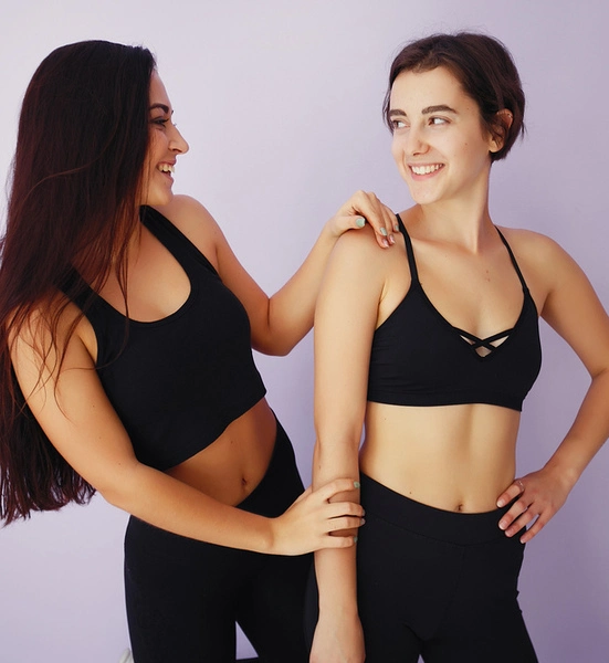 Women wearing custom made black sports bra