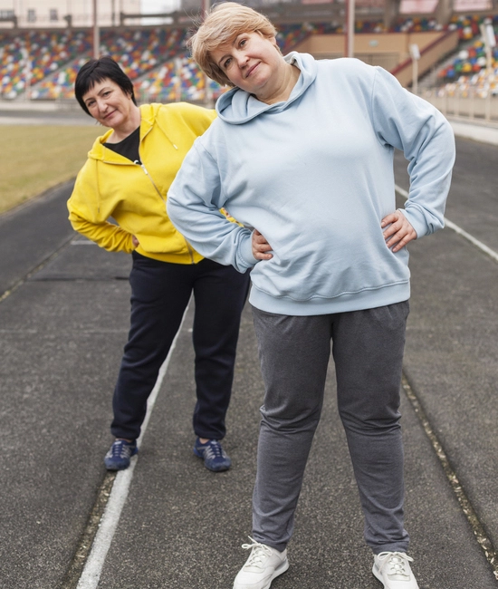 Women wearing custom made tracksuit